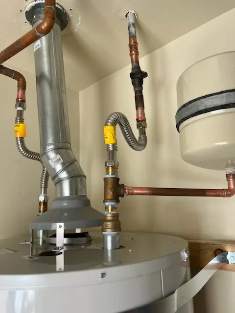 Water heater installation and plumbing repair in Main Street Merchants
